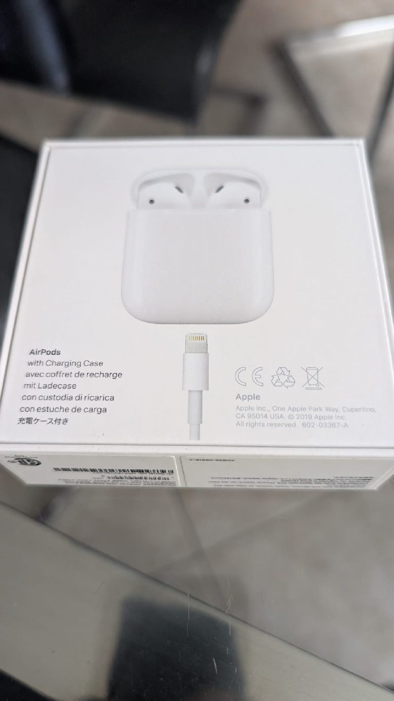 Apple AirPods with Charging Case - photo 3