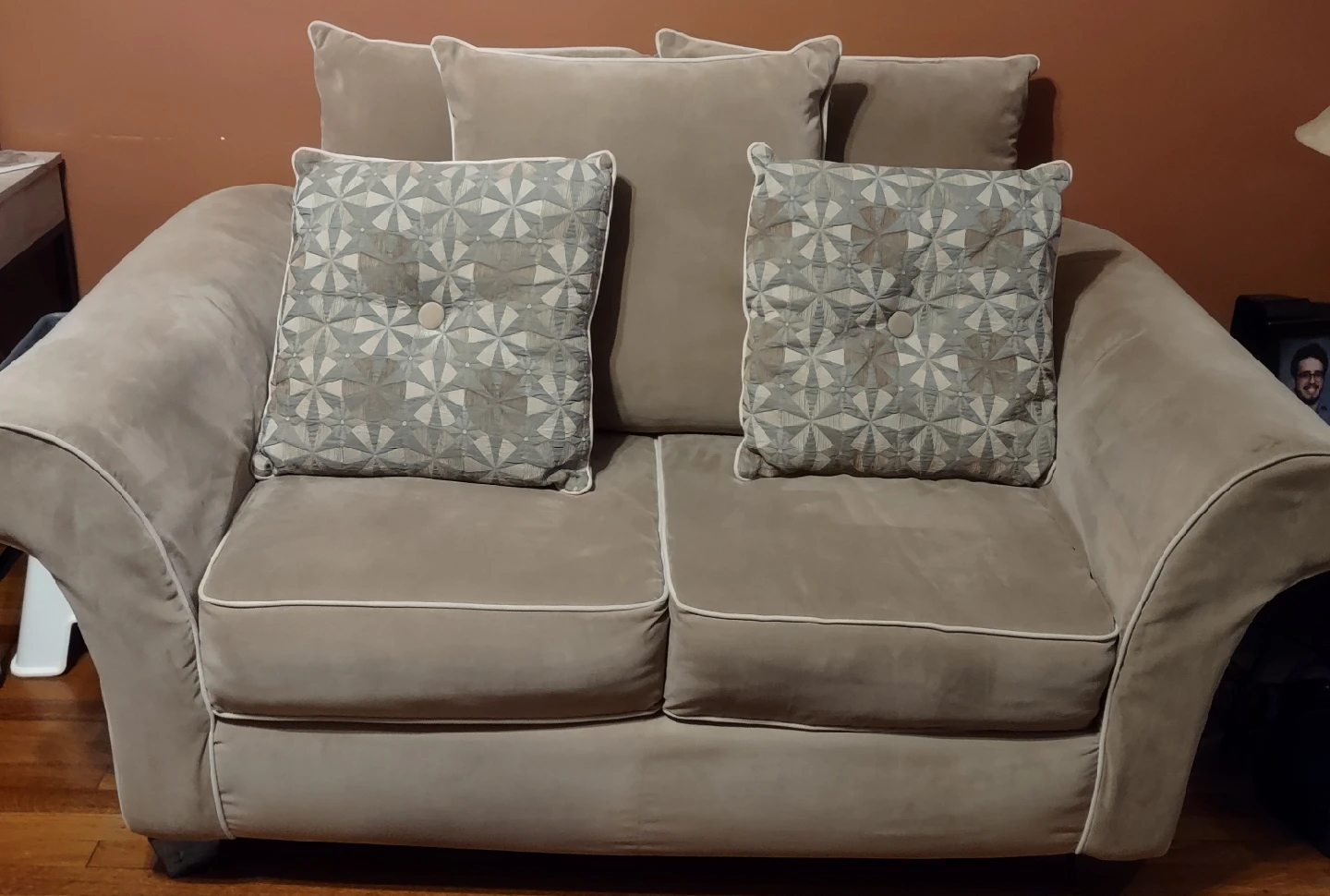 2 Tan Loveseat Sofas with Patterned Pillows - photo 2