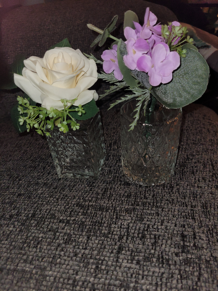 Two Small Glass Vases with Decorative Plastic Flowers