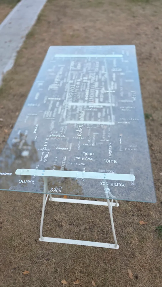 Glass Top Table with White Metal Legs image indicator(2)