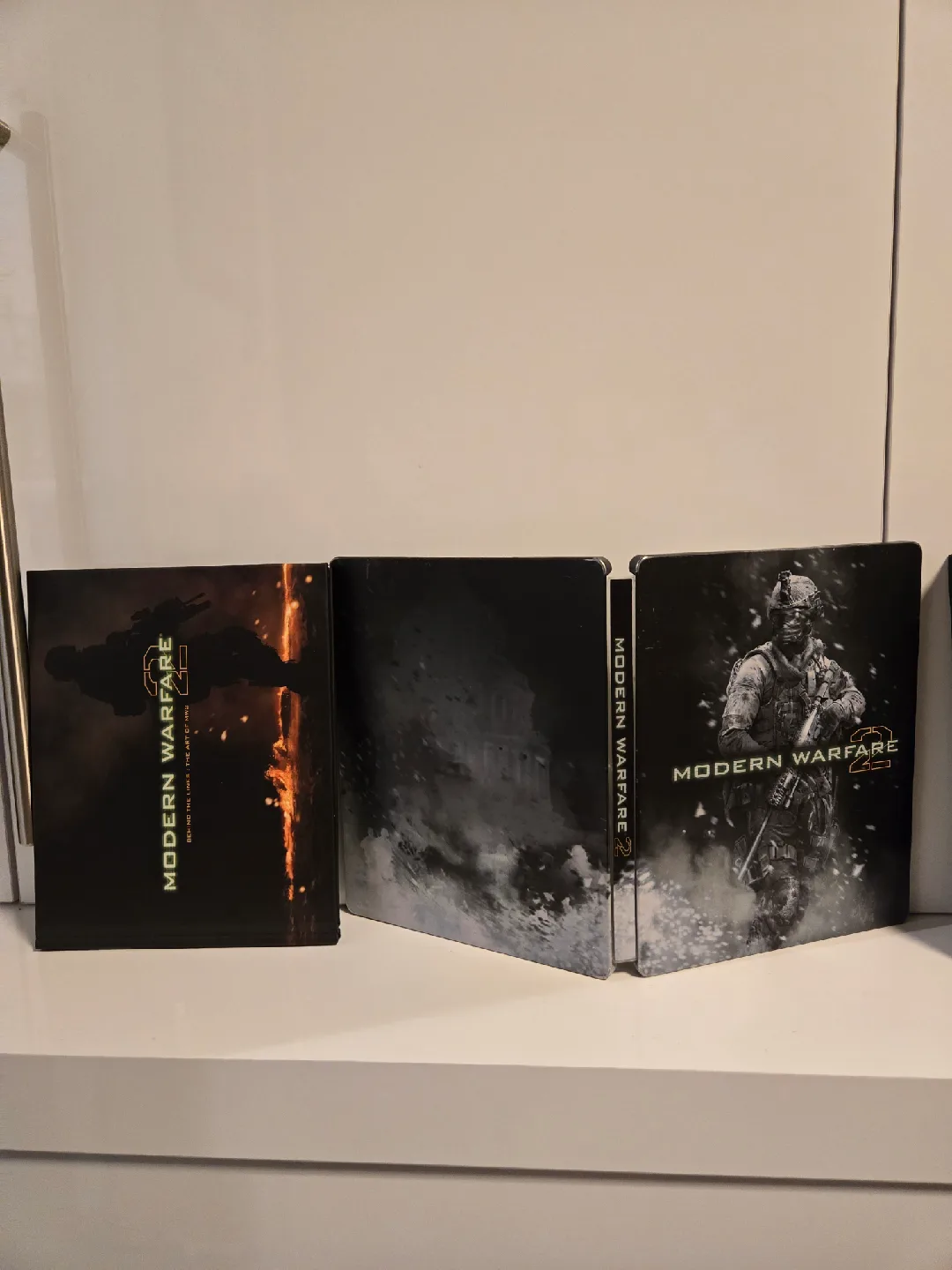 PS3 COD Steelbooks. with games. mw2 mw3 black ops Shipping. image indicator(3)