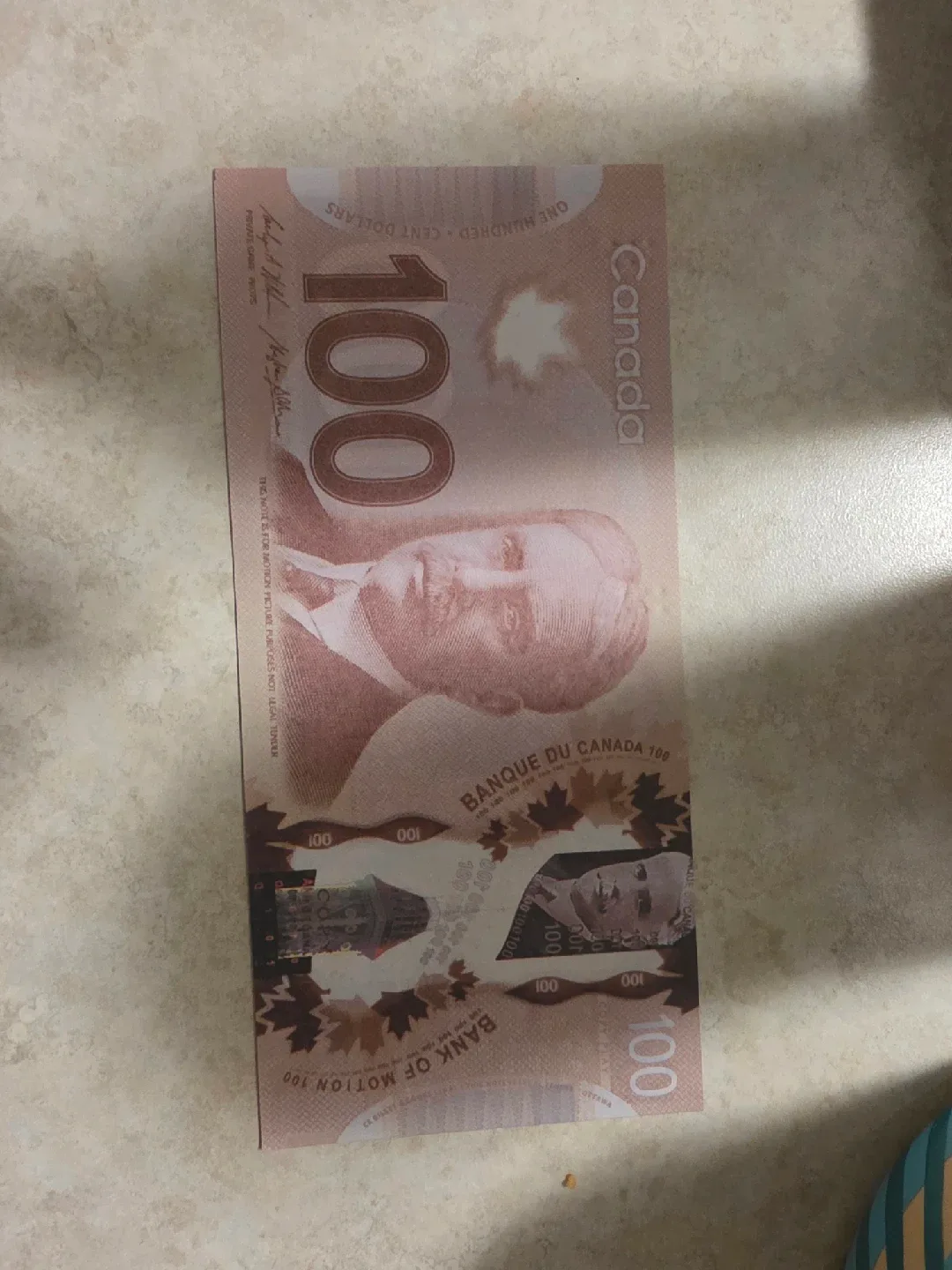 100 Canadian Dollar Prop