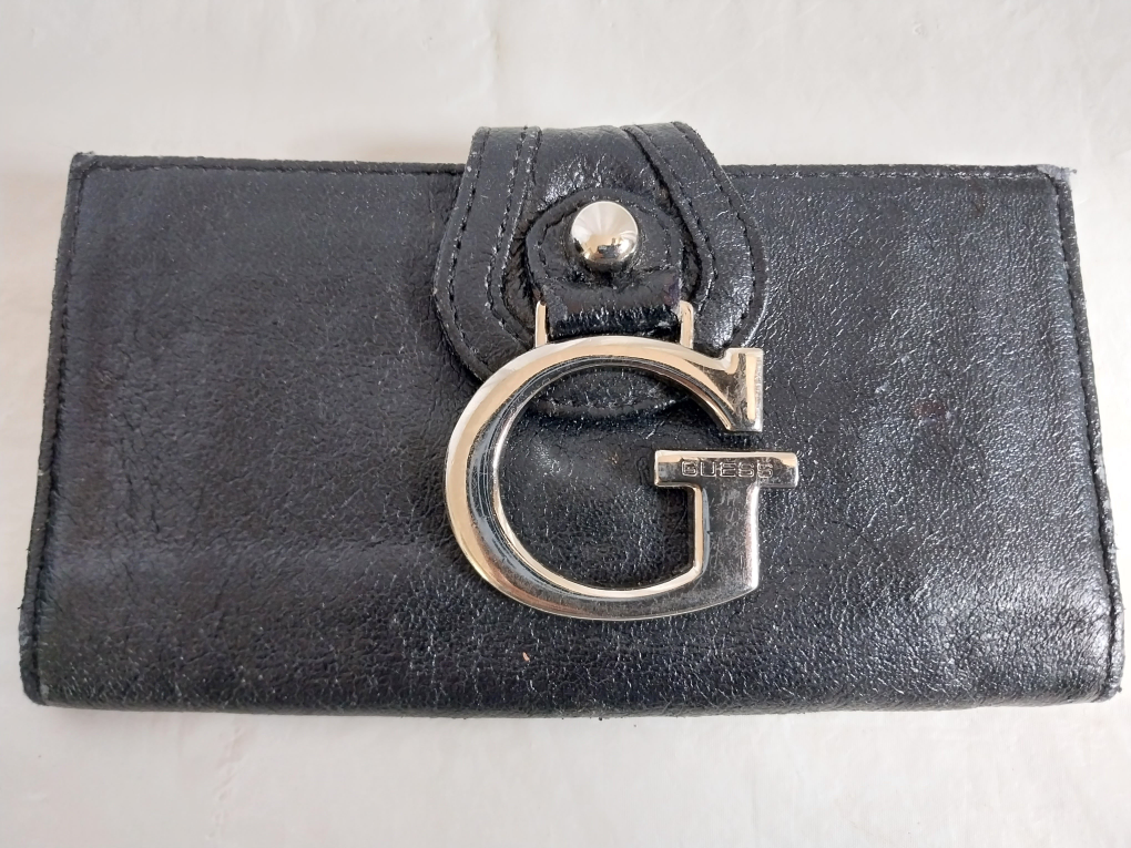 Guess Black Leather Wallet available. Fixed price.