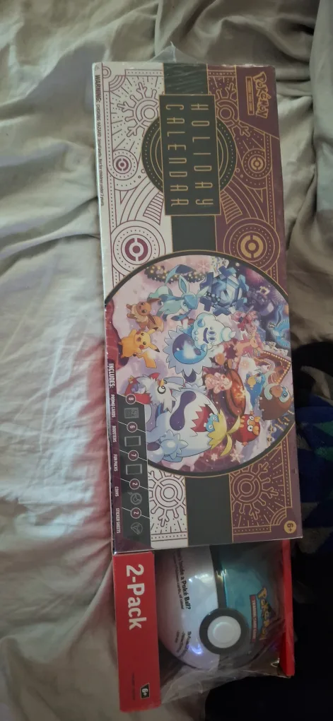 Pokémon TCG Holiday Calendar + Poké Ball Tin image indicator(2)