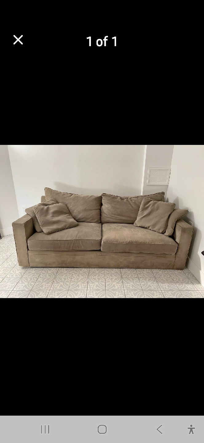 Comfortable Beige Sofa with Pillows