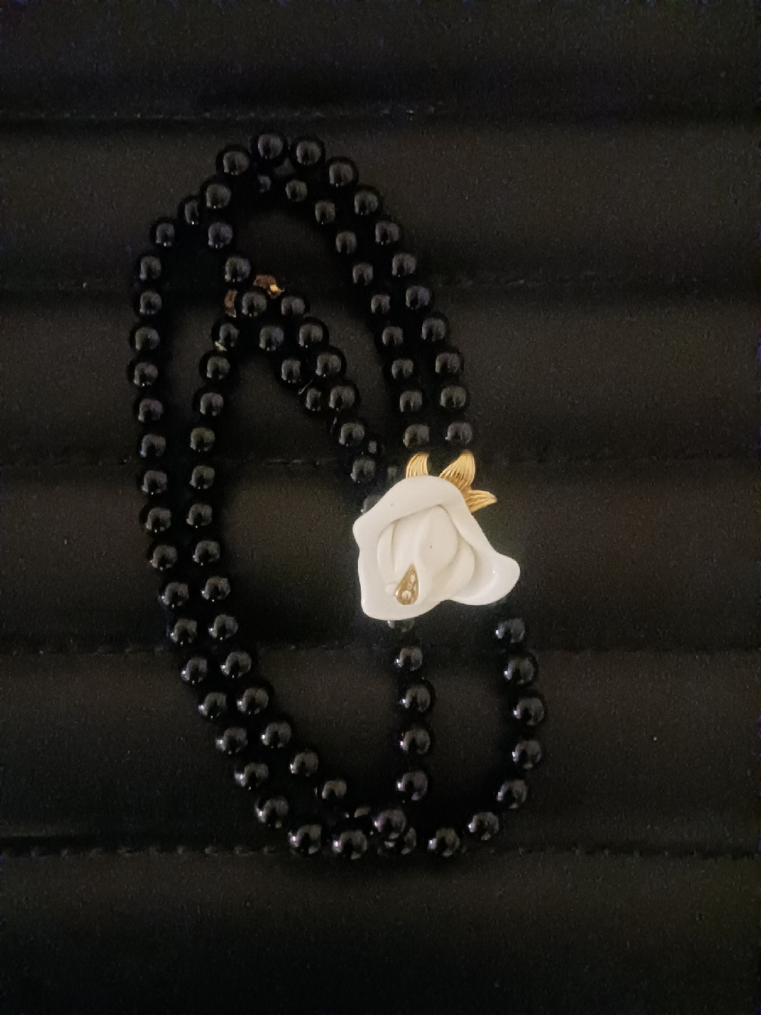 Black Bead Necklace with White Flower Pendant