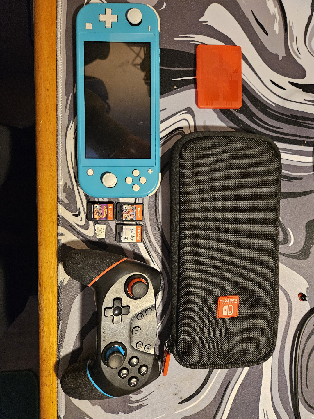 Nintendo Switch Lite (Blue) + Games & Accessories