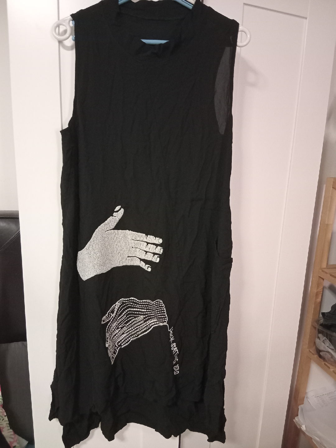 Black Sleeveless Dress with Hand Design
