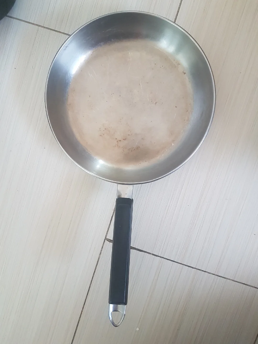 Used Silver Frying Pan with Black Handle