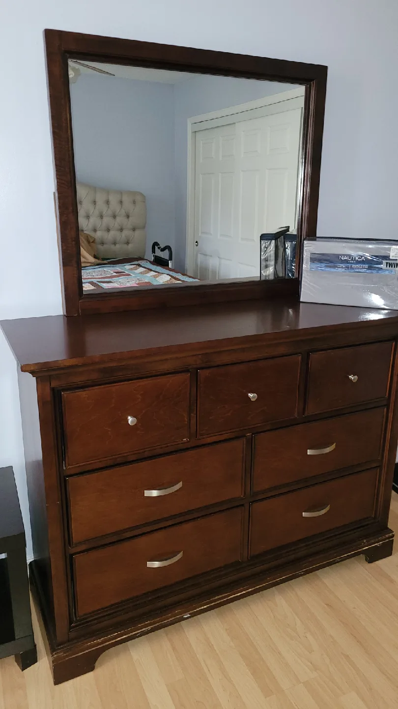 Couch, chair, end tabl,fireplace. image indicator(2)