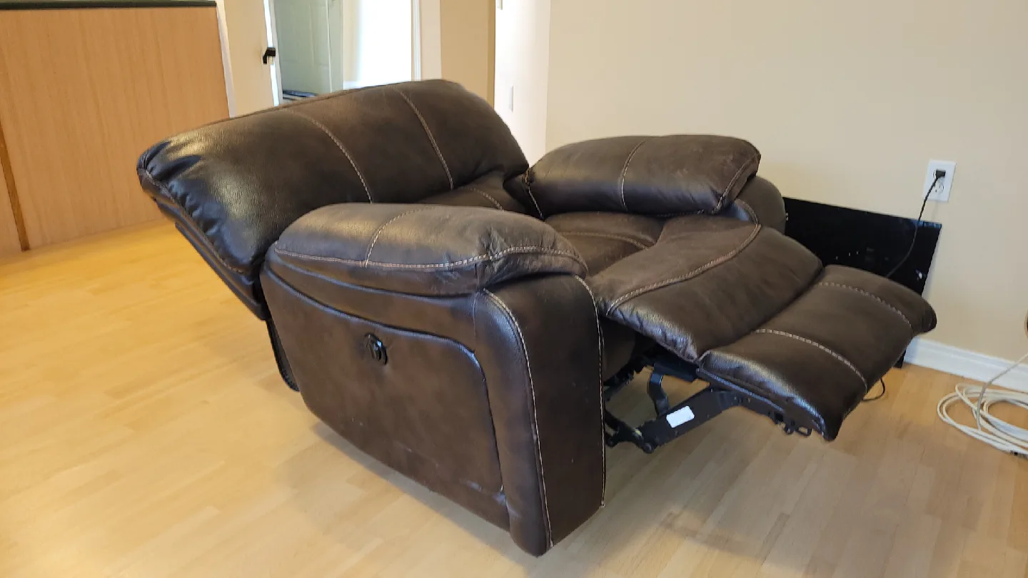 Couch, chair, end tabl,fireplace. image indicator(5)