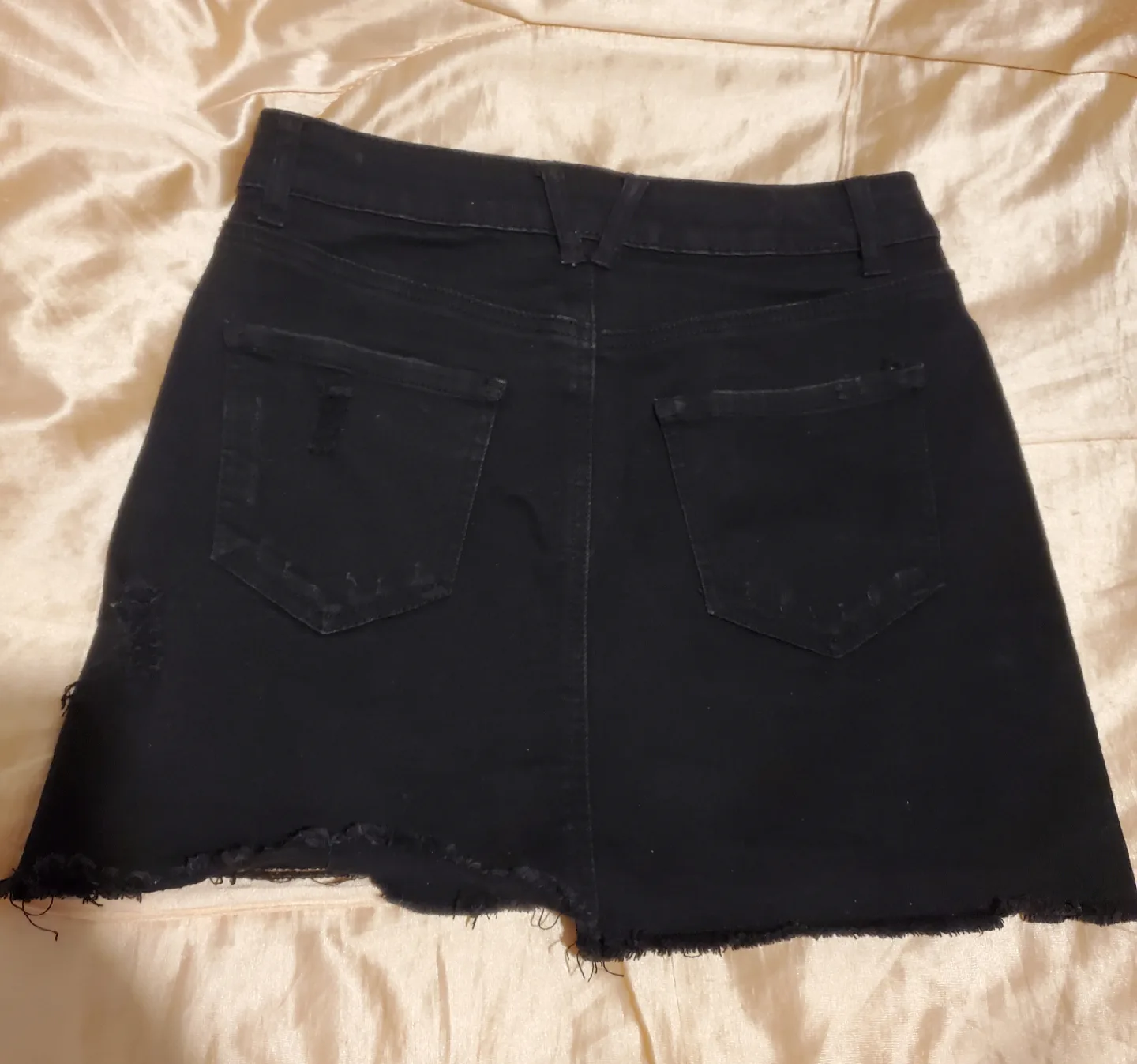 Wax Jean black denim mini skirt with frayed edges image indicator(2)
