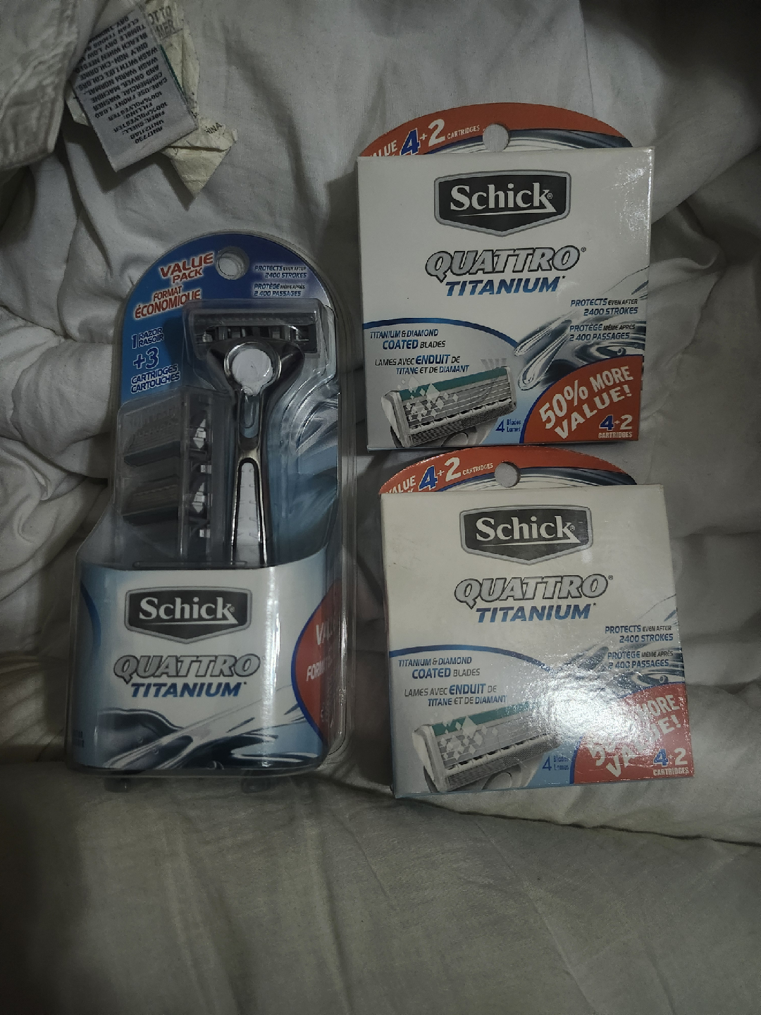 Schick Quattro Titanium Razor + 2 Refill Cartridge Packs