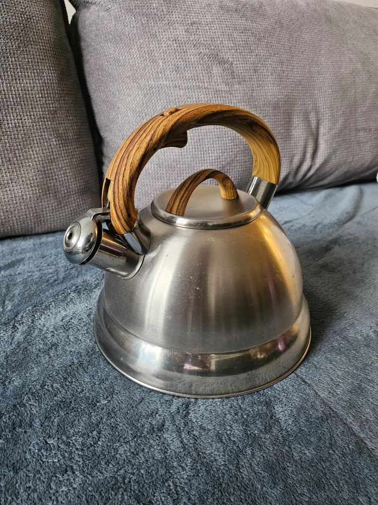 Stovetop kettle with button