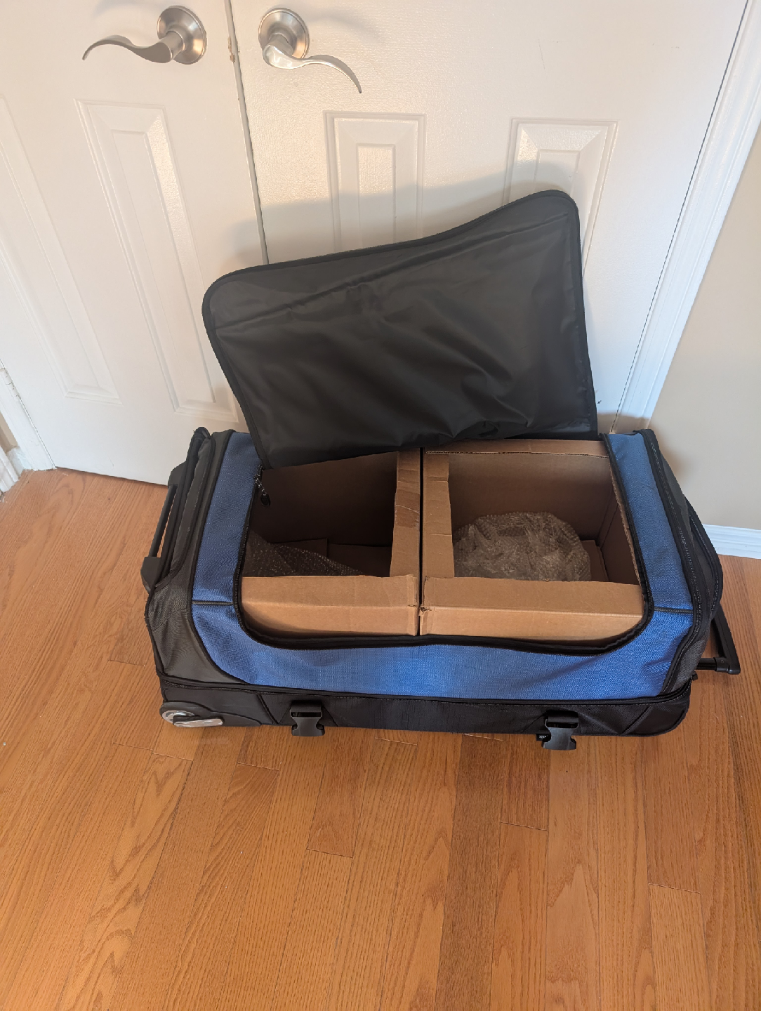 AmazonBasics Rolling Duffel Bag - Blue/Black - photo 3