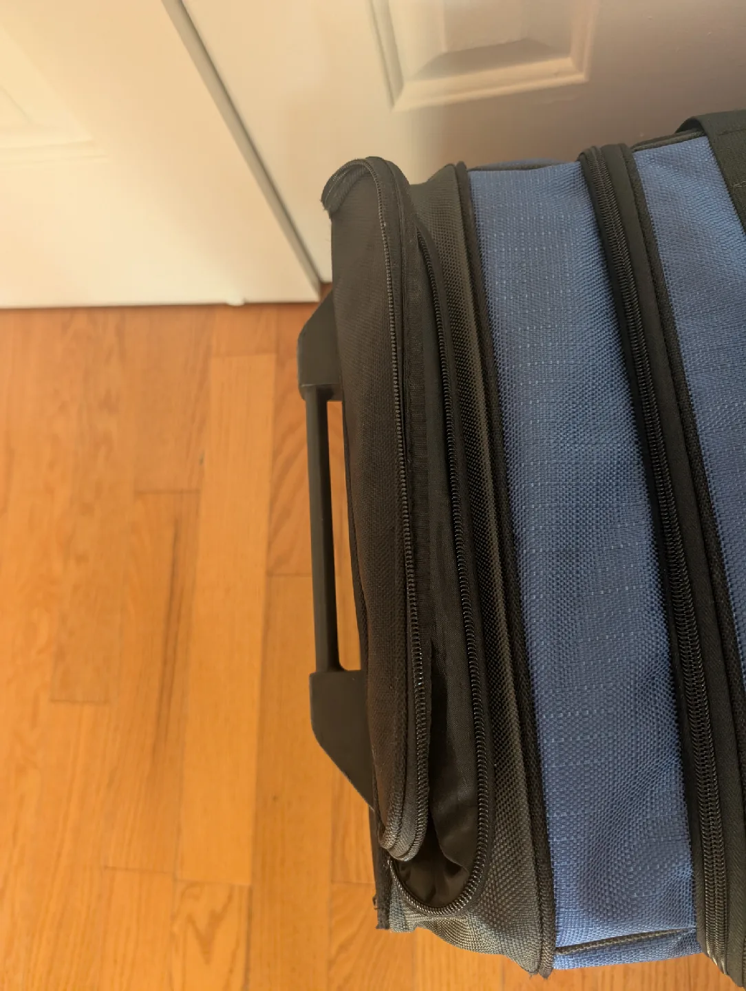 AmazonBasics Rolling Duffel Bag - Blue/Black image indicator(8)