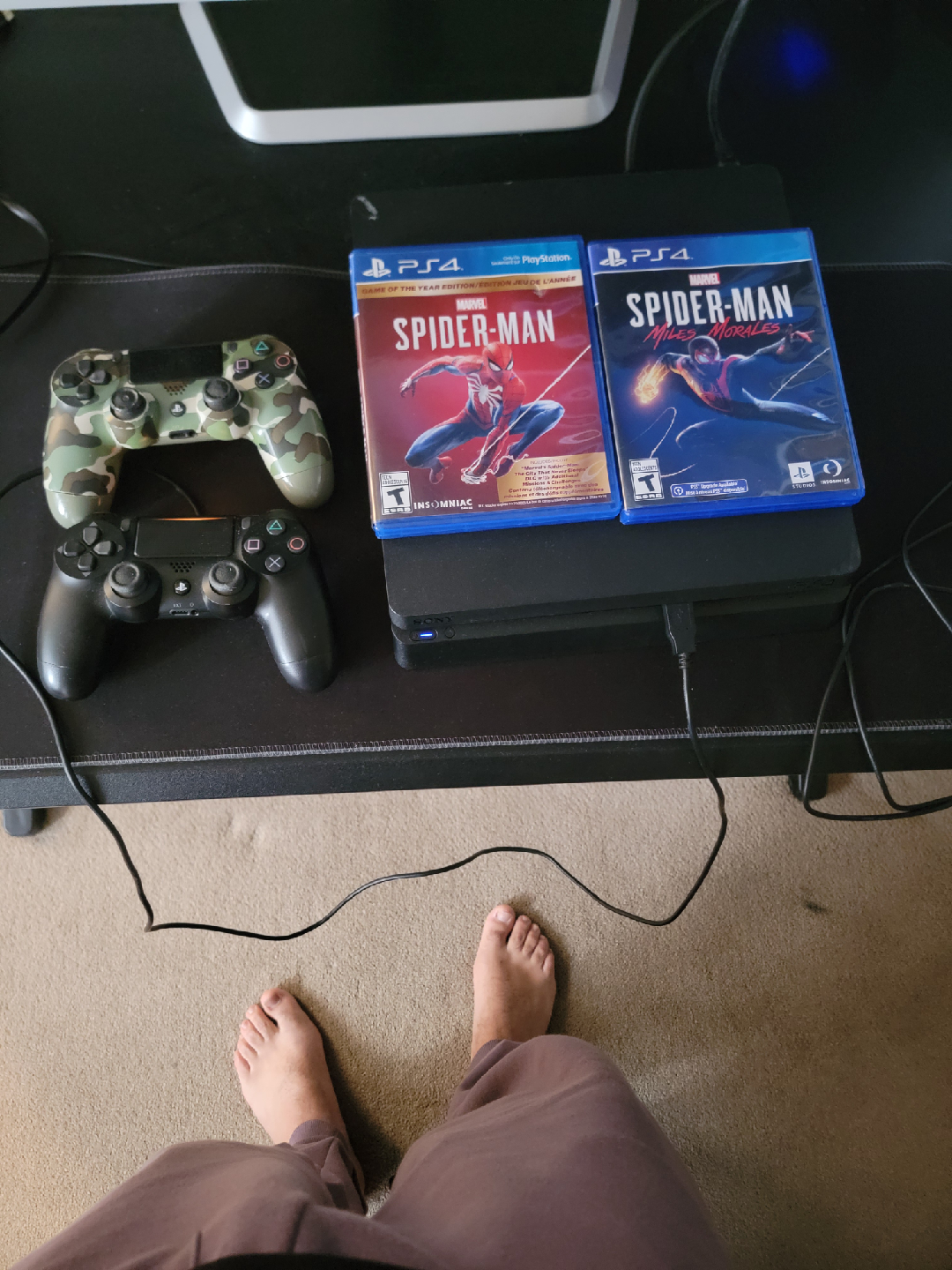 PlayStation 4 with Spider-Man Games