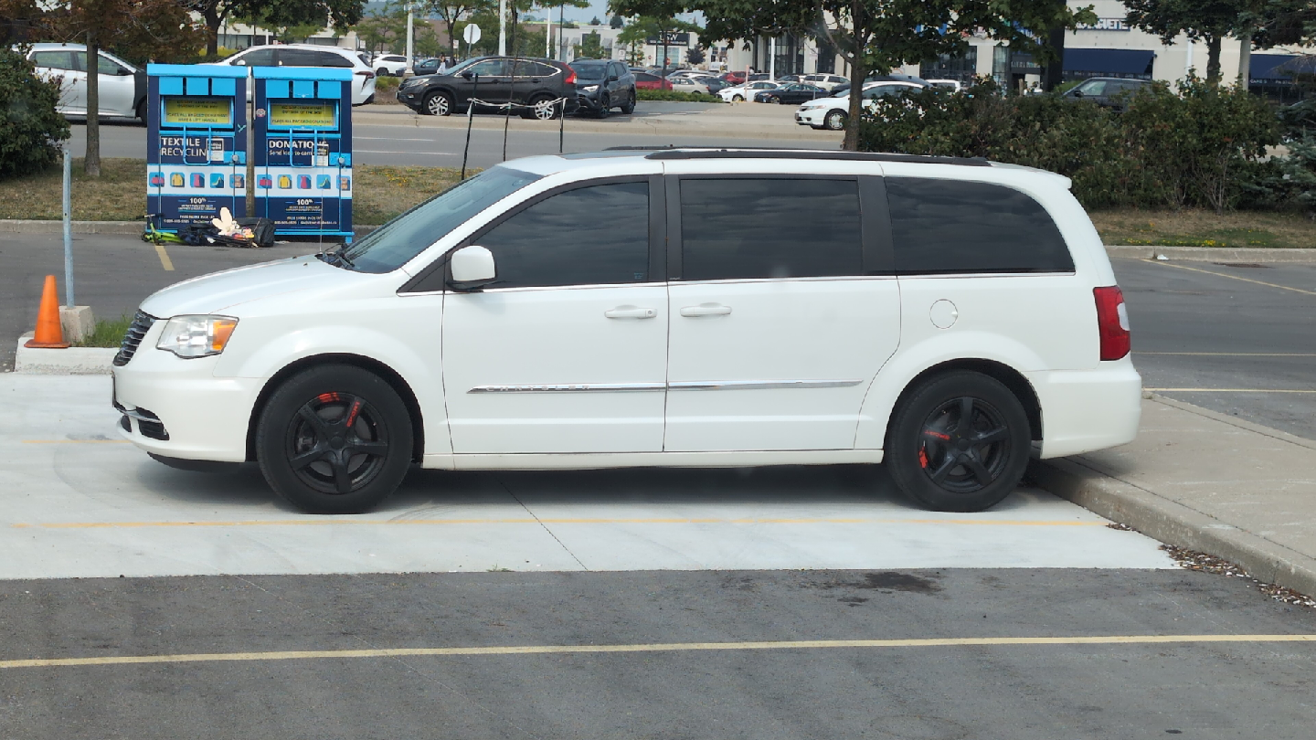 White Chrysler Town & Country Minivan - photo 4