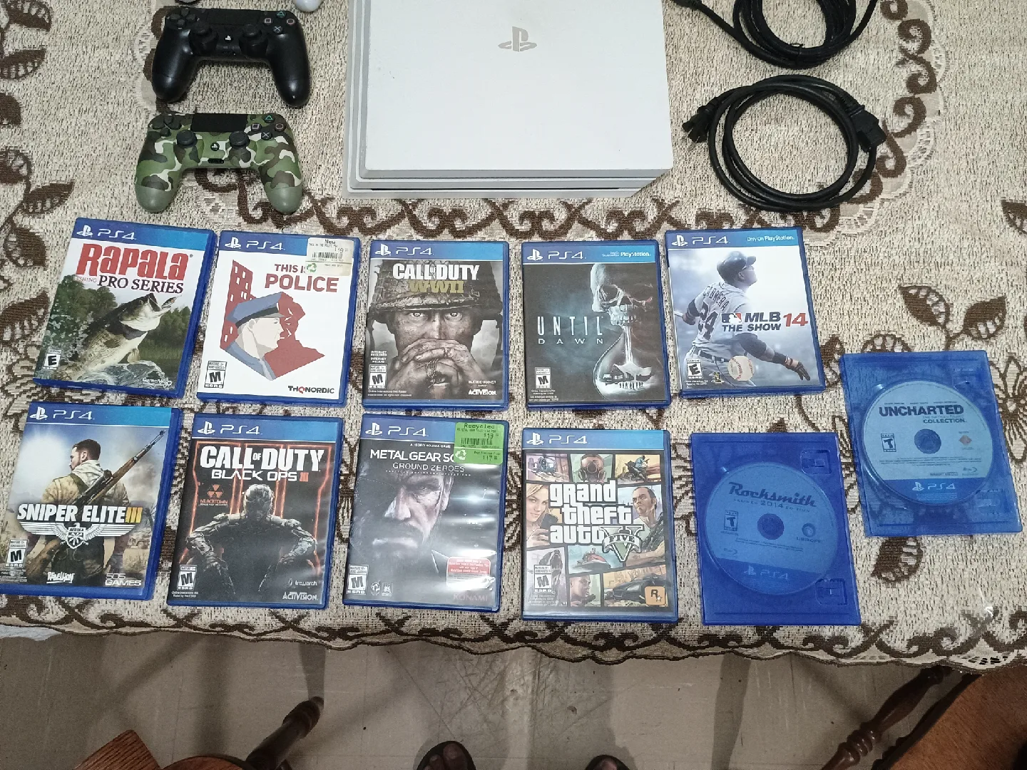 PlayStation 4 pro 1TB with 3 controllers + 11 games image indicator(2)