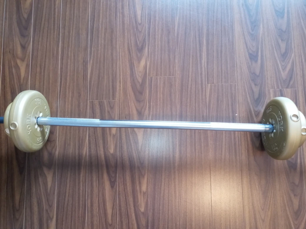 weight bar with some weights - photo 3