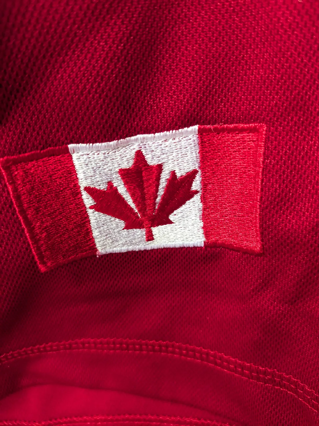 Canada Athletics Red Jersey sz LG image indicator(4)