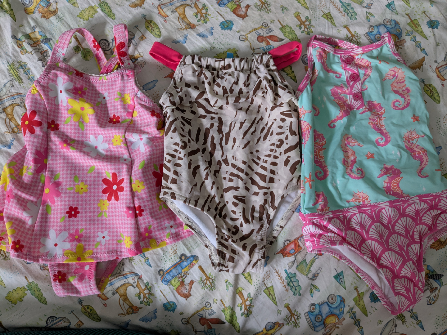 Girls' Swimsuits  $３ each or $７ for ３
