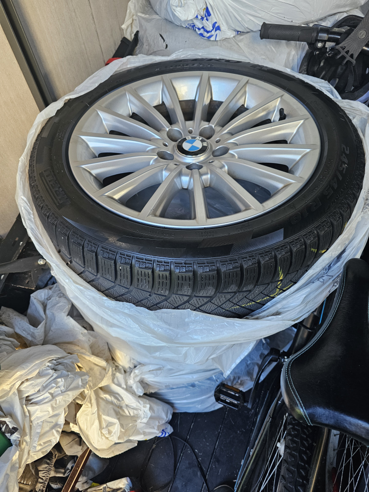 245 45 R18 Pirelli winter tires on BMW wheels 5x120