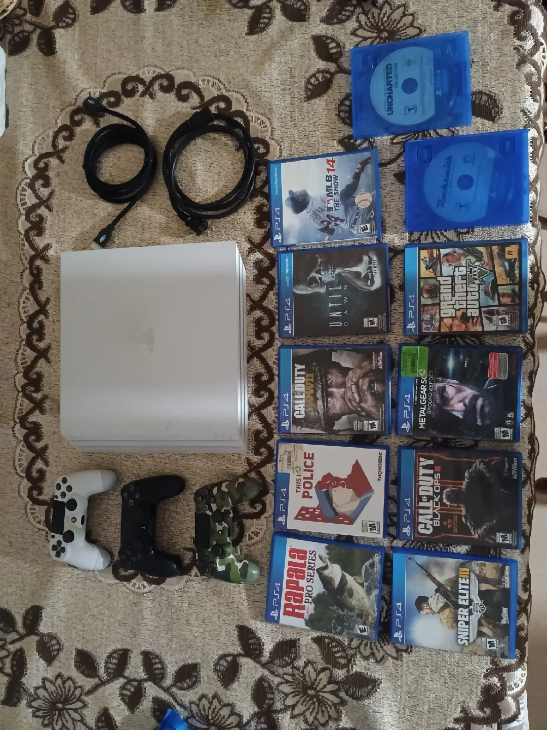 PlayStation 4 pro 1TB with 3 controllers + 11 games image indicator(8)