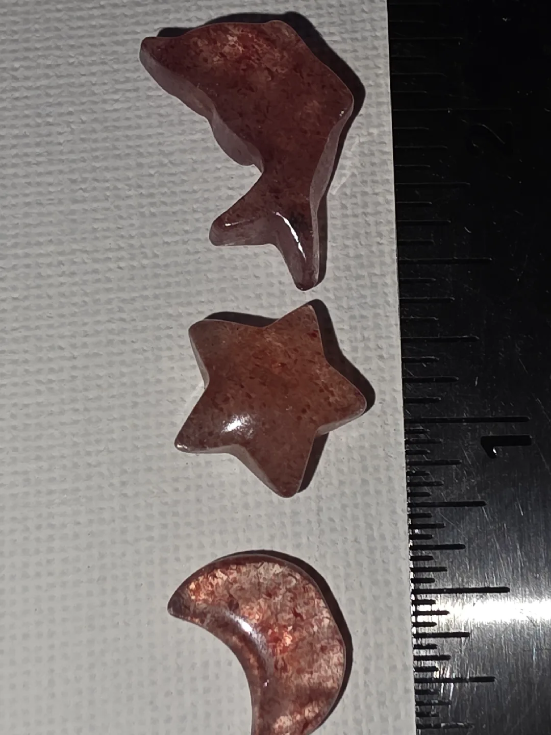 strawberry quartz minis on purple fluorite bowl.