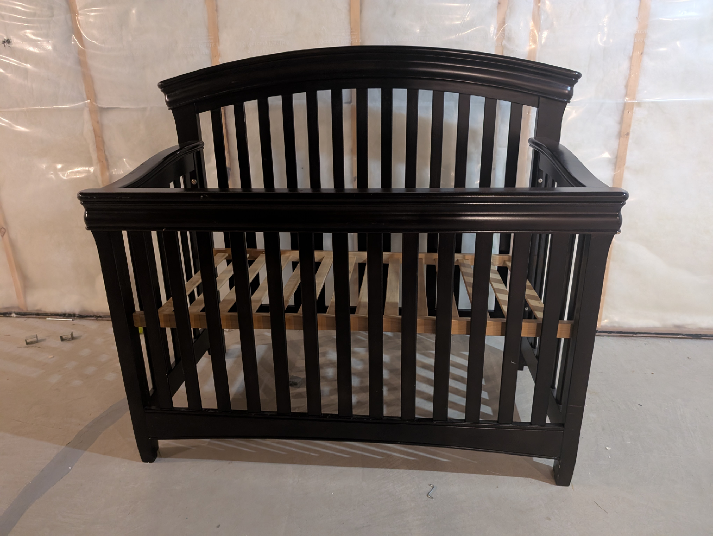 Black Baby Crib with baby bed.