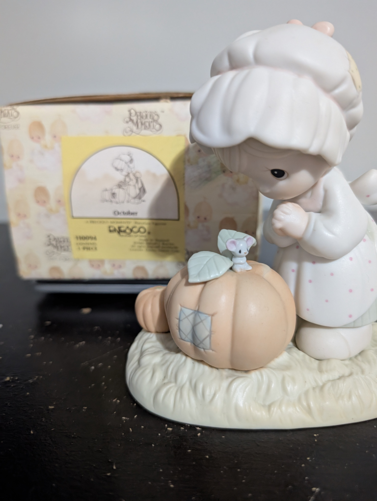 Precious Moments October Figurine
