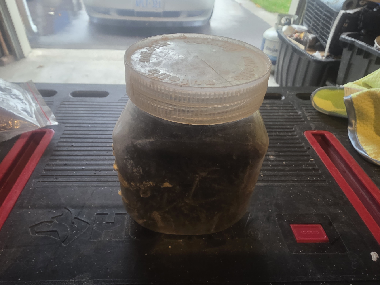 container of drywall screws