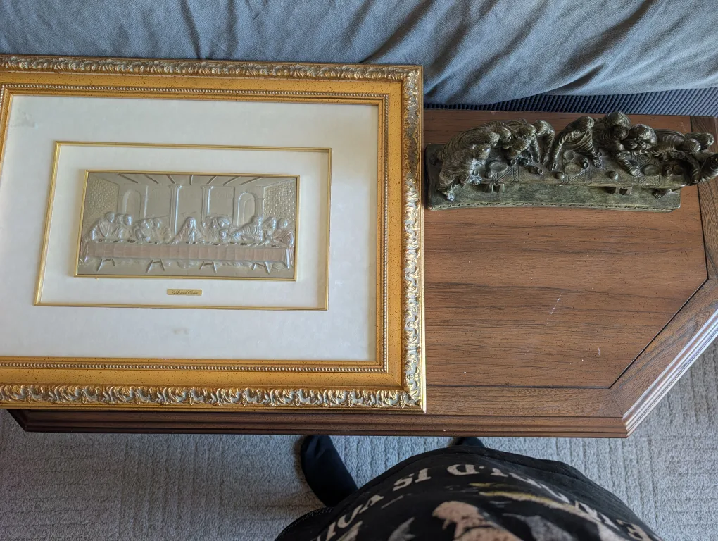 framed picture and sculpture of jesus last supper