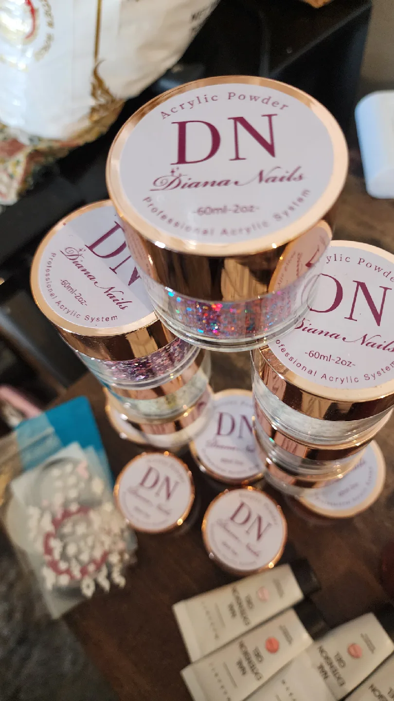 Variety of Nail Art Supplies: Powders, Gels, Glitters image indicator(8)