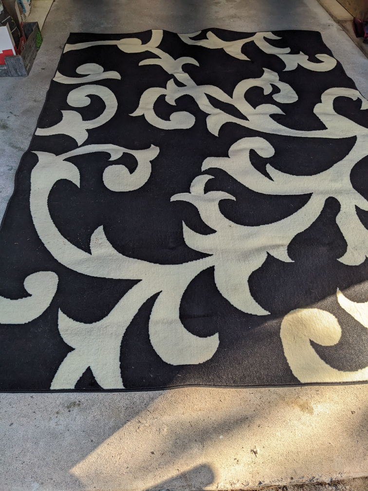 Black & Cream Rug with Floral Design