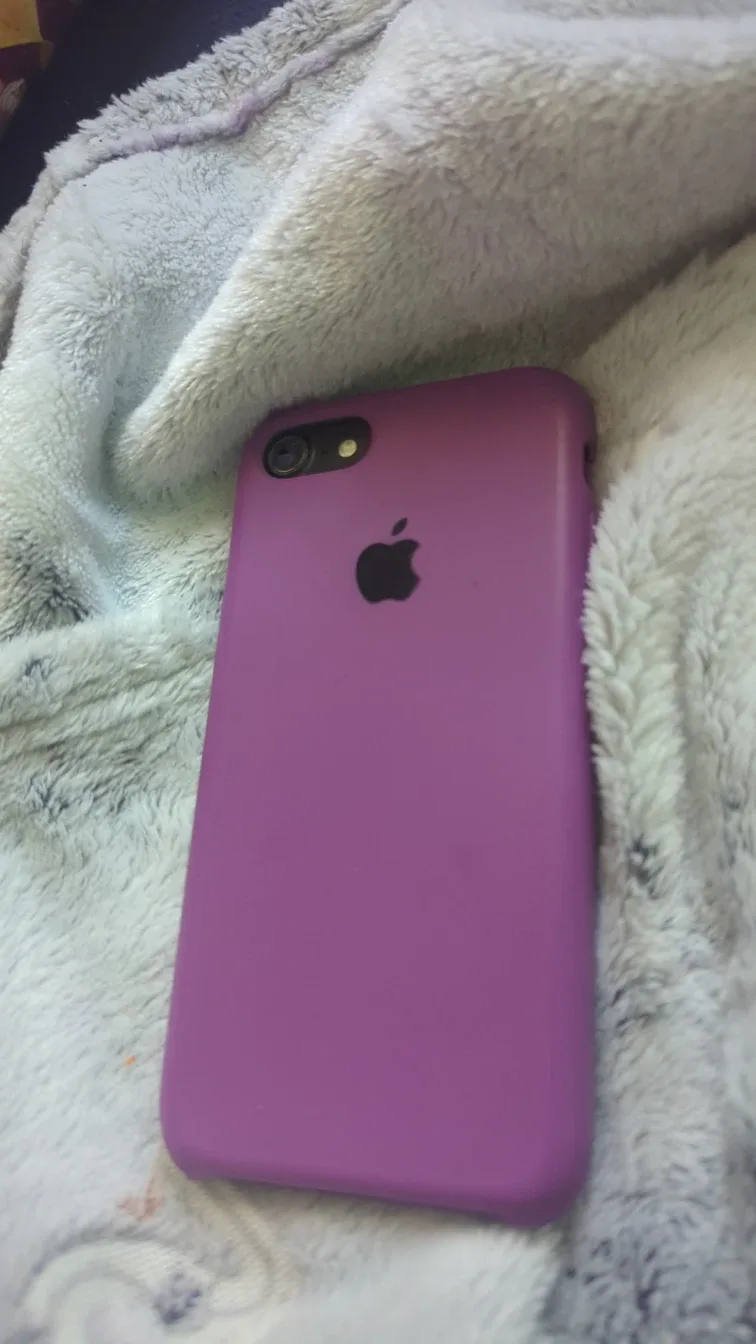 iPhone in Purple Case image indicator(2)
