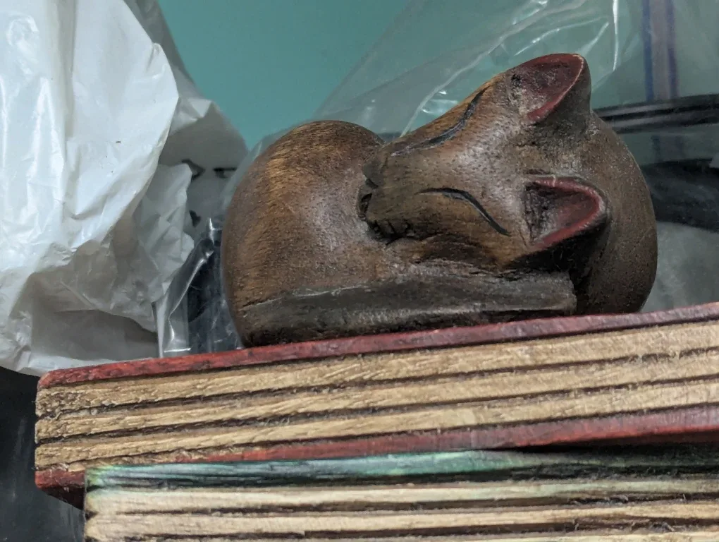 Wooden Cat Figurine on Books image indicator(2)