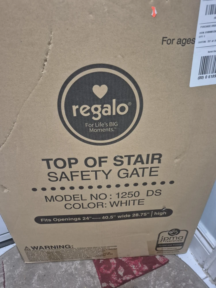 Top of the stairs safety gate - photo 3