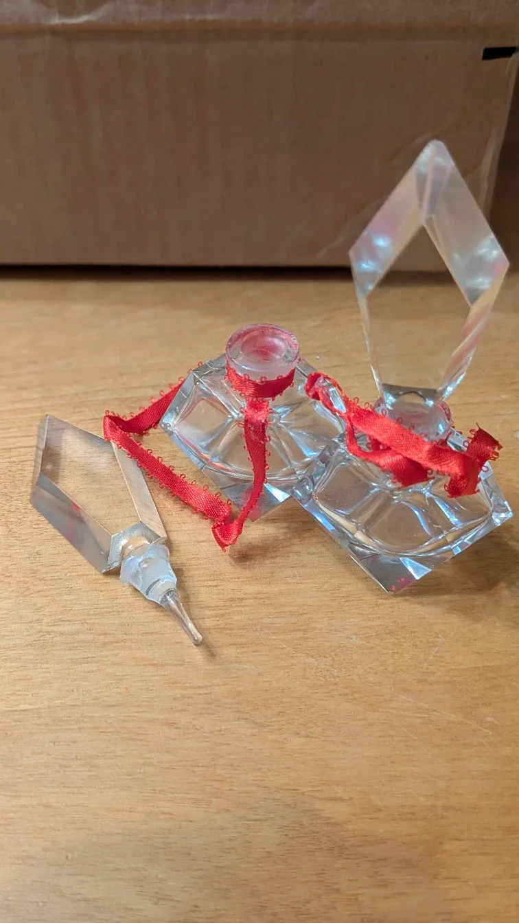 Perfume Bottles with Red Ribbon