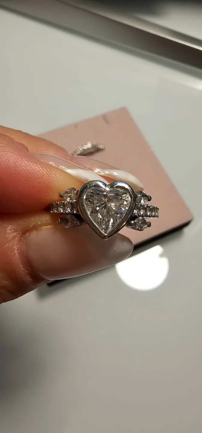 .81 Carat VS1 Heart Cut Diamond Ring with Marquis diamonds image indicator(2)
