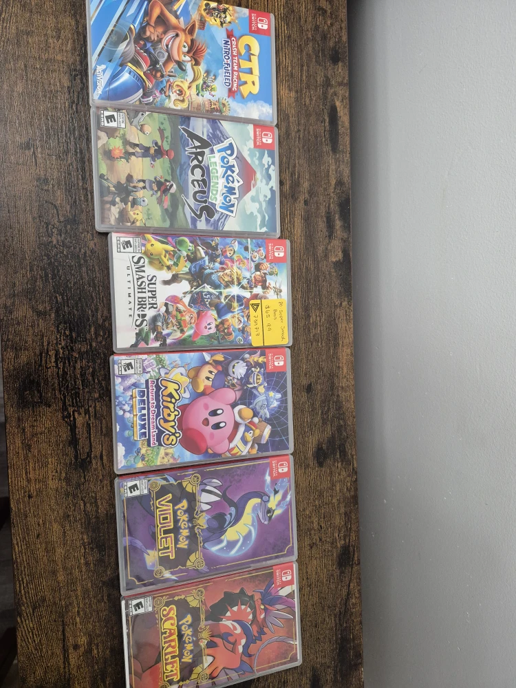 Nintendo Switch OLED + Games (used) - photo 2