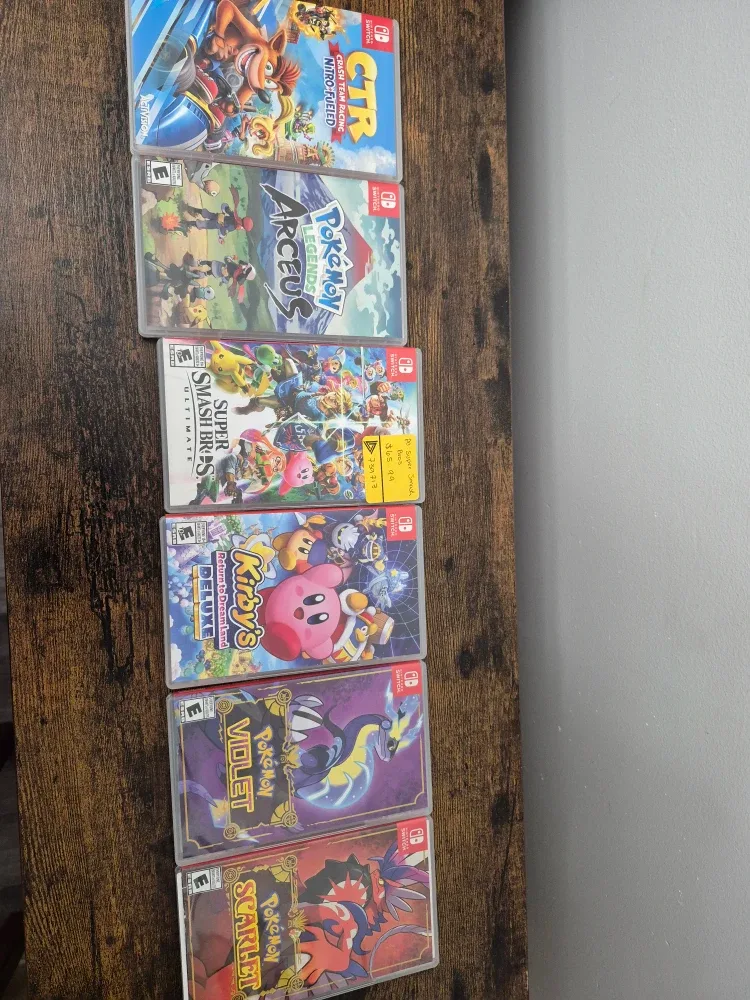 Nintendo Switch OLED + Games (used) image indicator(2)