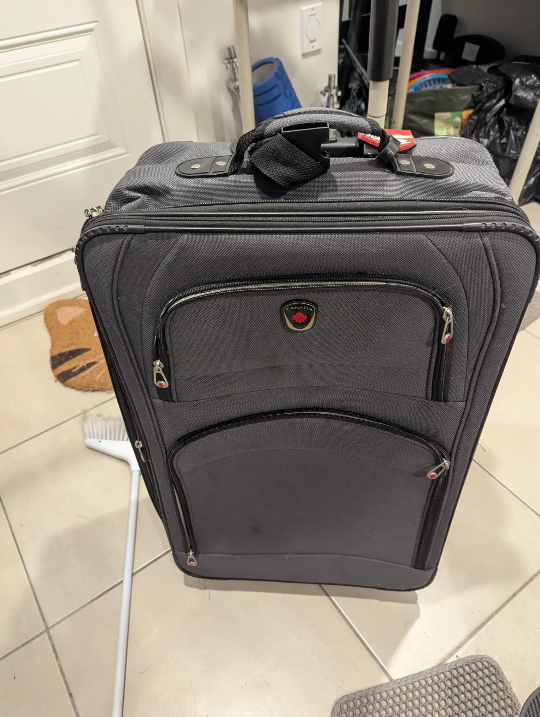 Gray Canada Luggage FREE