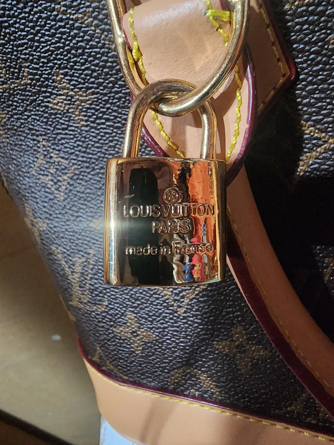Louis Vuitton Alma Handbag Brown image indicator(7)