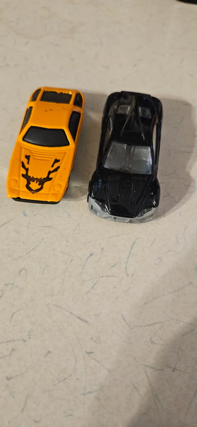 Two Toy Cars - Yellow and Black image indicator(2)