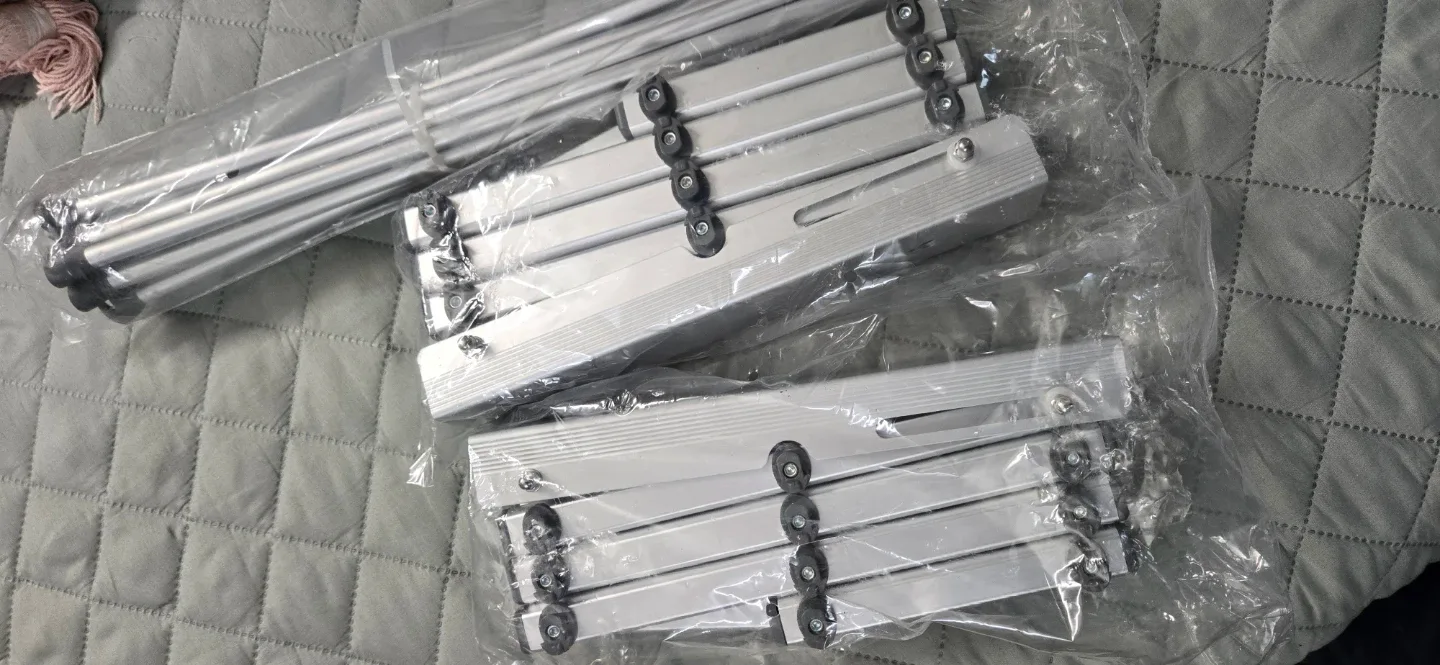 Woolite Aluminum Wall-Mount Accordion Drying Rack - New image indicator(3)