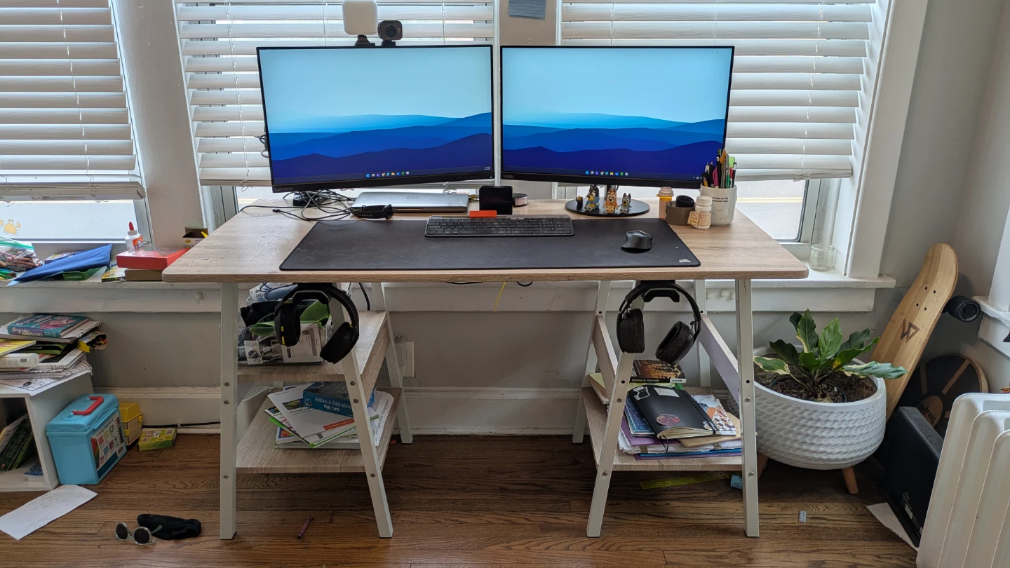 Big desk with metal frame.