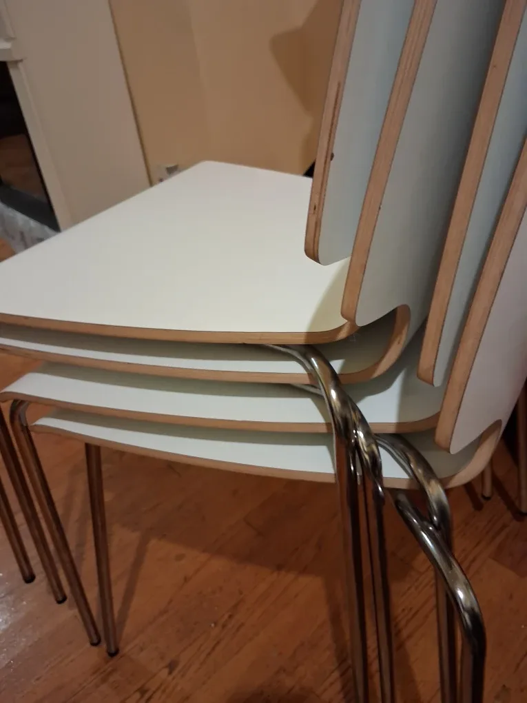 Set of 4 White Stacking Chairs image indicator(4)