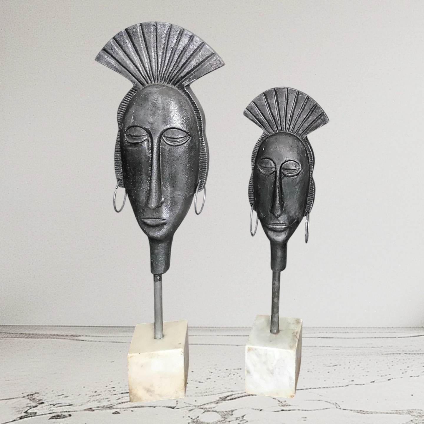 Pair of Decorative Metal AfricanFace Sculptures - photo 2