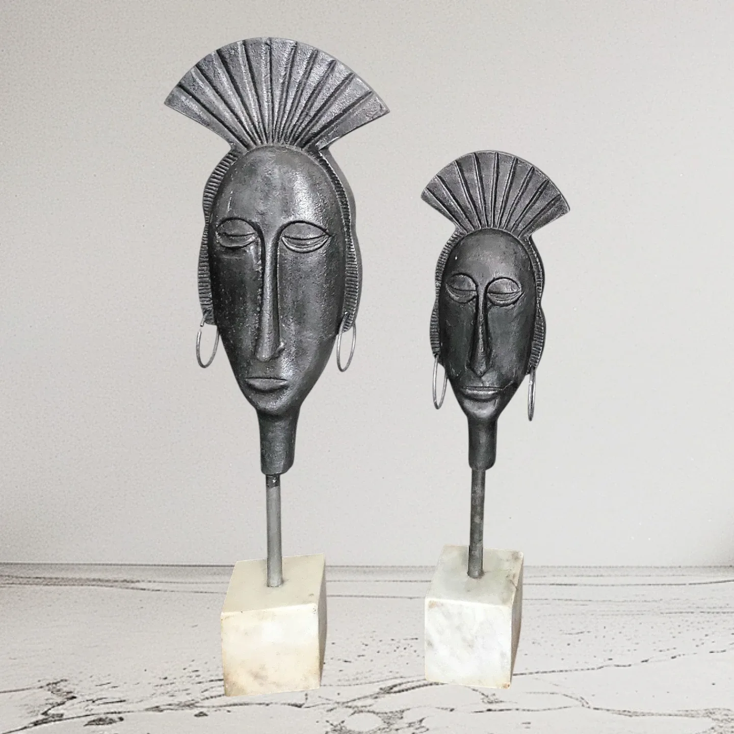 Pair of Decorative Metal AfricanFace Sculptures image indicator(2)